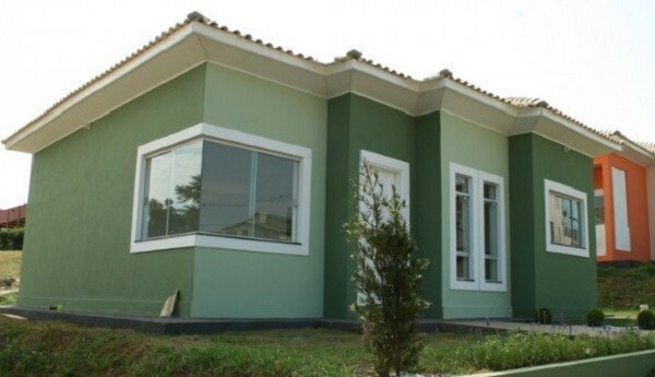 Cores de casas: fachada verde é uma tendência