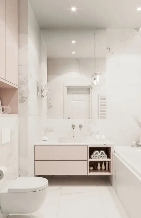 banheiro feminino todo branco decorado com móveis em rosa pastel Foto Eduardo Cavalcanti Castro