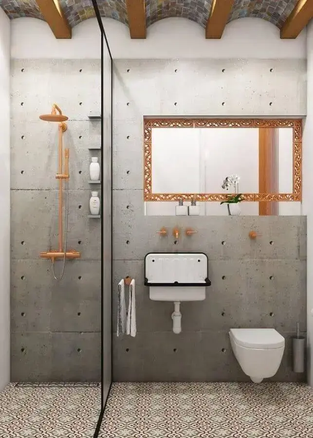 decoração industrial banheiro com cimento queimado e detalhes em cobre Foto INKREACJE