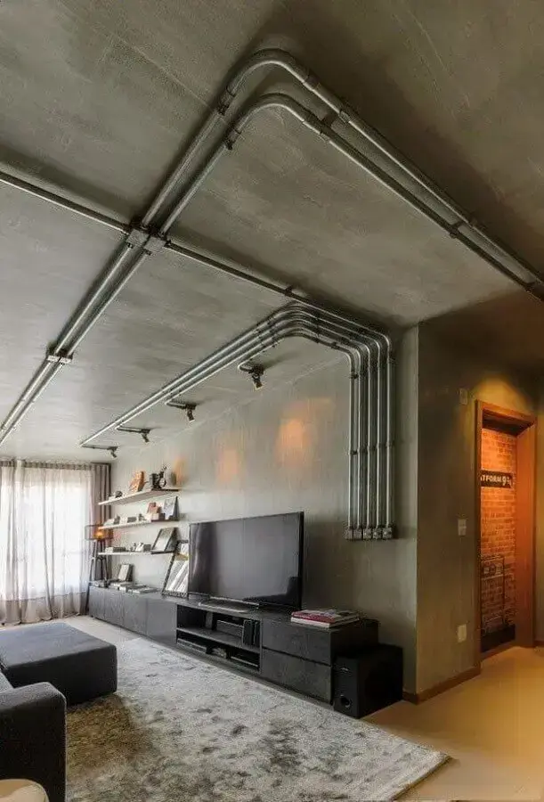 decoração industrial sala com cimento queimado e tubulação aparente Foto Futurist Architecture