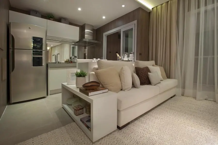 sofá para apartamento - sala com móveis em tons pastéis 