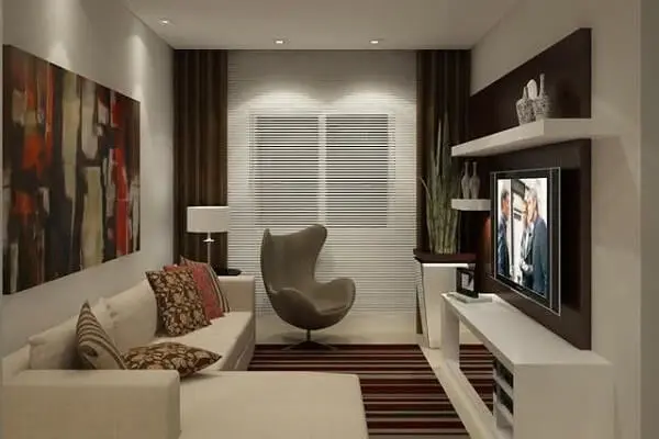 As poltronas para sala de tv podem ser posicionadas próxima a cortina do ambiente