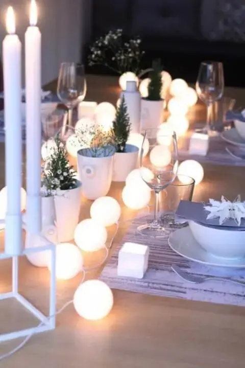 Round lights as Christmas dinner table decoration