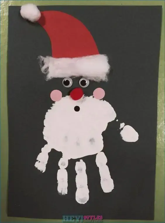 cartão de natal - cartão com mão formando papai noel