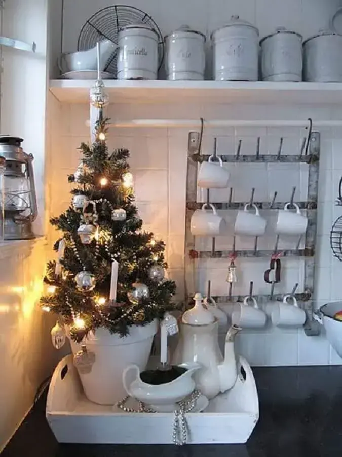 kitchen decoration with small christmas tree Photo Live Master