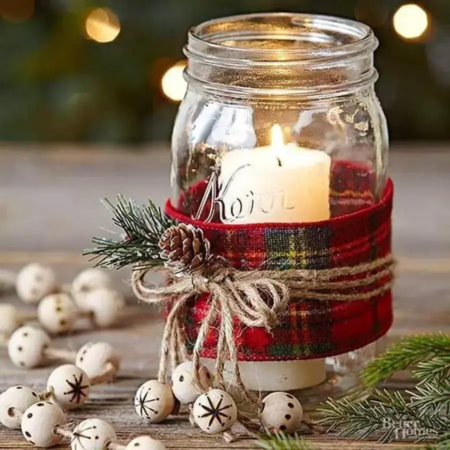 simple christmas decoration with candle inside decorated glass pot Photo Make At Home