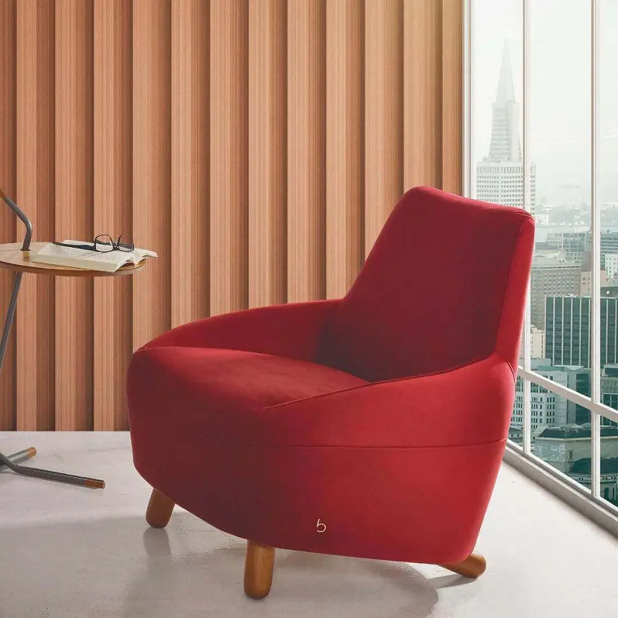 escritório decorado com poltrona vermelha confortável Foto Bell'arte Living