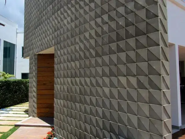 parede 3d - fachada com revestimento 3d cinza 