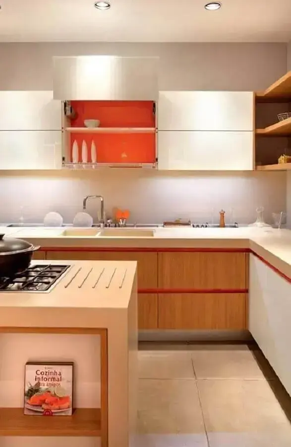 projeto de cozinha planejada com armários laranja por dentro Foto Pinterest