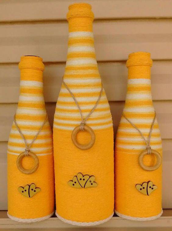 garrafas decoradas com barbante - garrafas com barbantes amarelos 