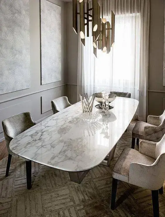 mesa de mármore - mesa de mármore com cadeiras prateadas 