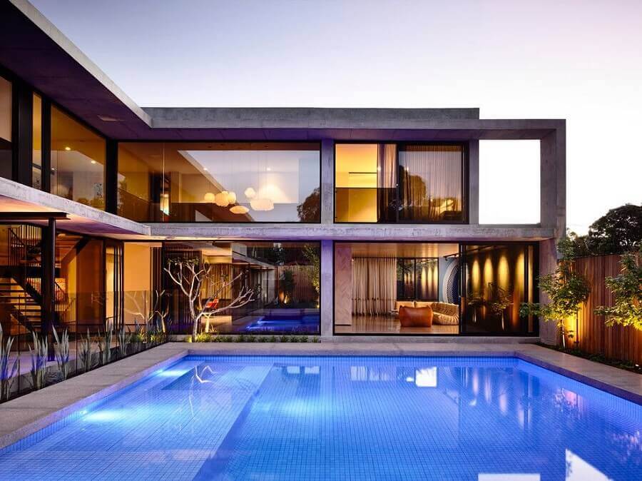 projeto de casa em l com piscina e paredes de vidro Foto Pinterest