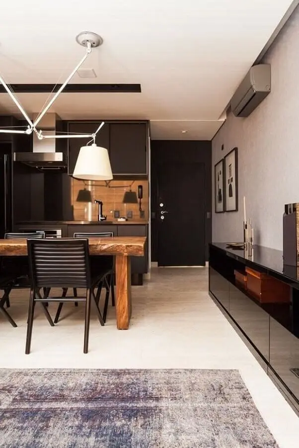 cor preta e madeira para decoração de casa com ambientes integrados Foto Archzine