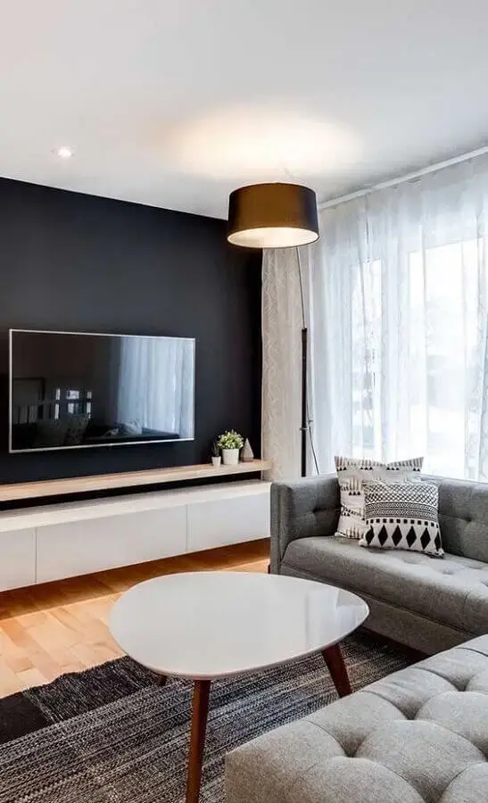 parede na cor preta para sala de estar com sofá cinza Foto Ideias Decor