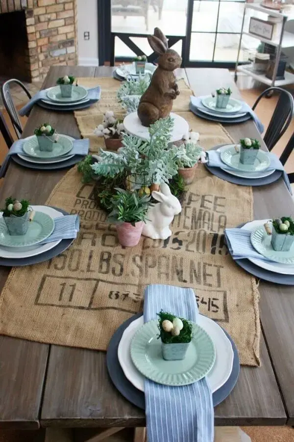 Simple decoration for Easter table with wooden rabbit