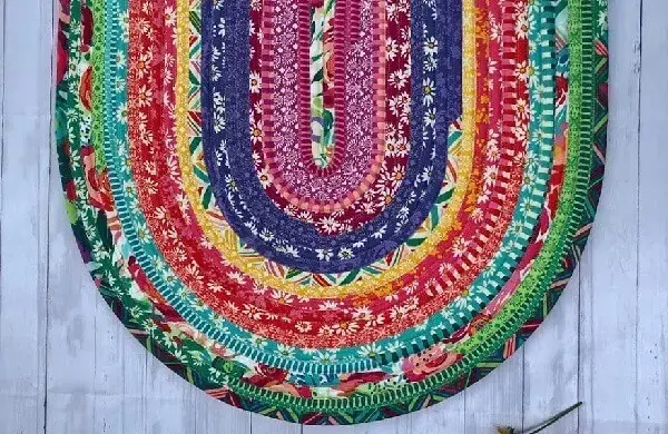 Modelo de tapete de retalho trançado colorido