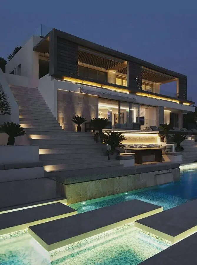 casas de luxo moderna com iluminação para piscina Foto We Heart It