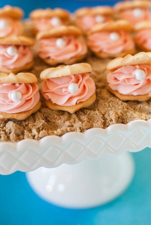 doces decorados em formato de concha para festa sereia Foto Cupcake Art