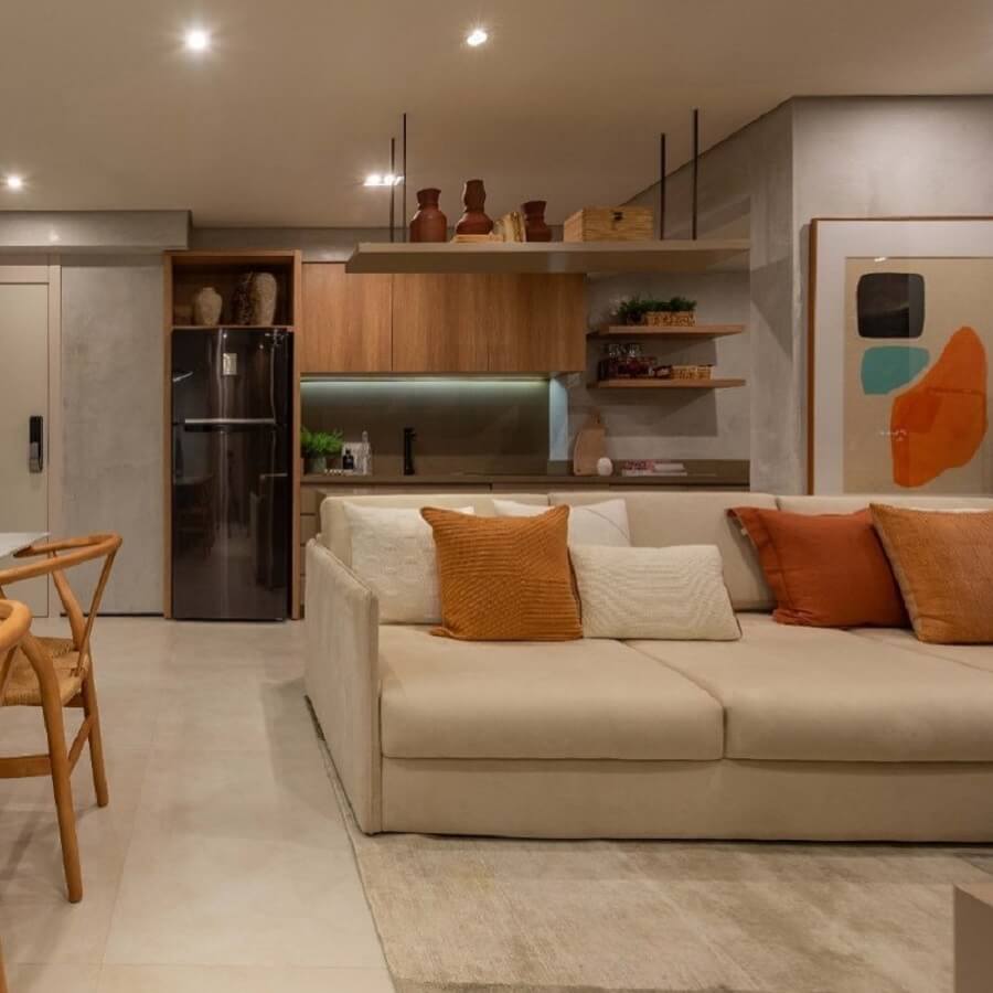Decoração moderna para casa conceito aberto com sofá bege Foto Trico Decor