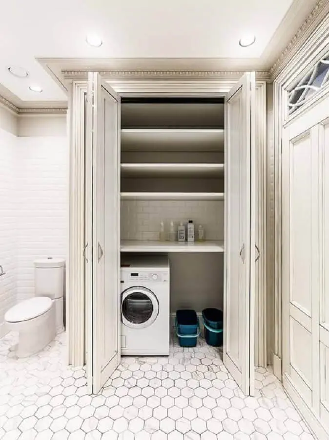banheiro com modelos de lavanderia embutida dentro de armário Foto Pinterest