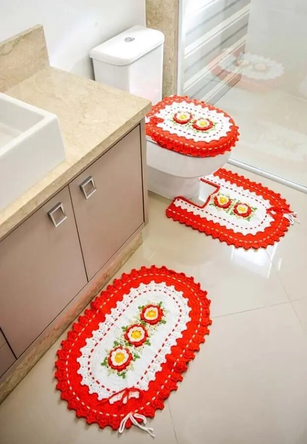 modelo de jogo de banheiro com flores de crochê laranja e bege Foto Pinterest