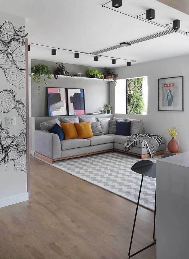 quadros decorativos abstratos coloridos para decoração de sala cinza com sofá com chaise Foto Futurist Architecture