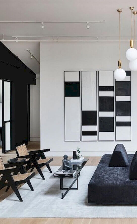 sala moderna preta e branca decorada com quadros decorativos abstratos Foto Pinterest