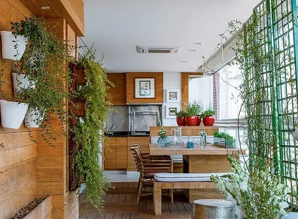 As plantas podem decorar a área da churrasqueira a gás para apartamento