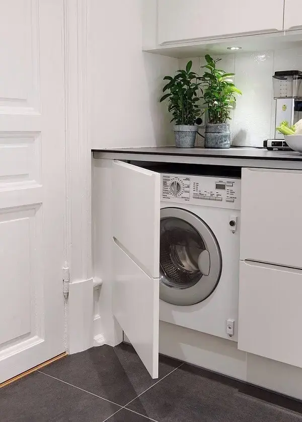 Opte por móveis para lavanderia funcionais e criativos