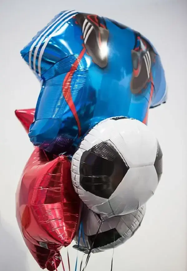 Balloons can't miss the soccer-themed birthday party