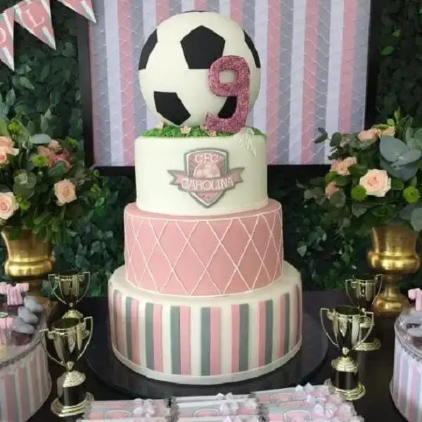 Cake for party theme girls football made in several layers