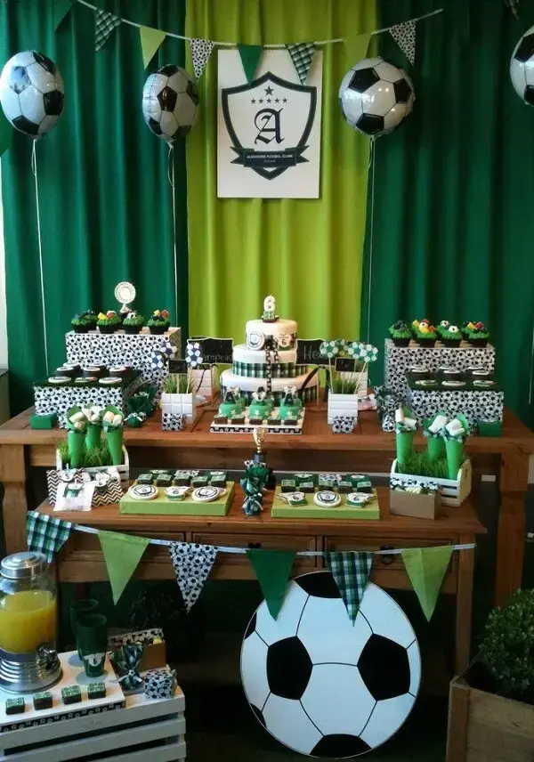 Fabric curtain complements the decoration of the football theme party