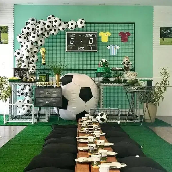 Gather the children of the party theme football at a single table