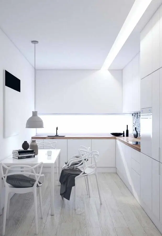 armário de cozinha completo branco de canto com bancada de madeira Foto Futurist Architecture