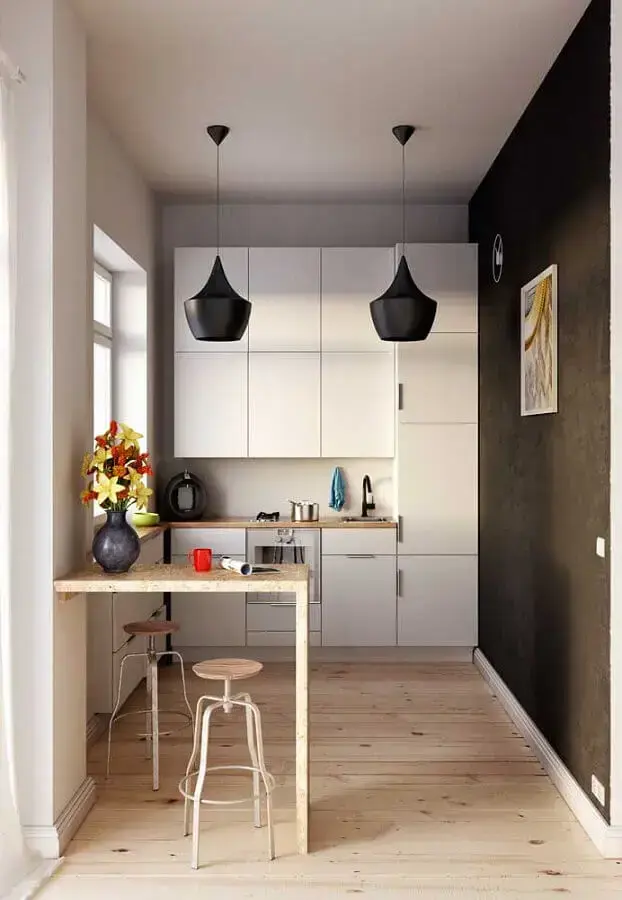 armário pequeno de cozinha planejada com parede preta Foto Ideias Decor