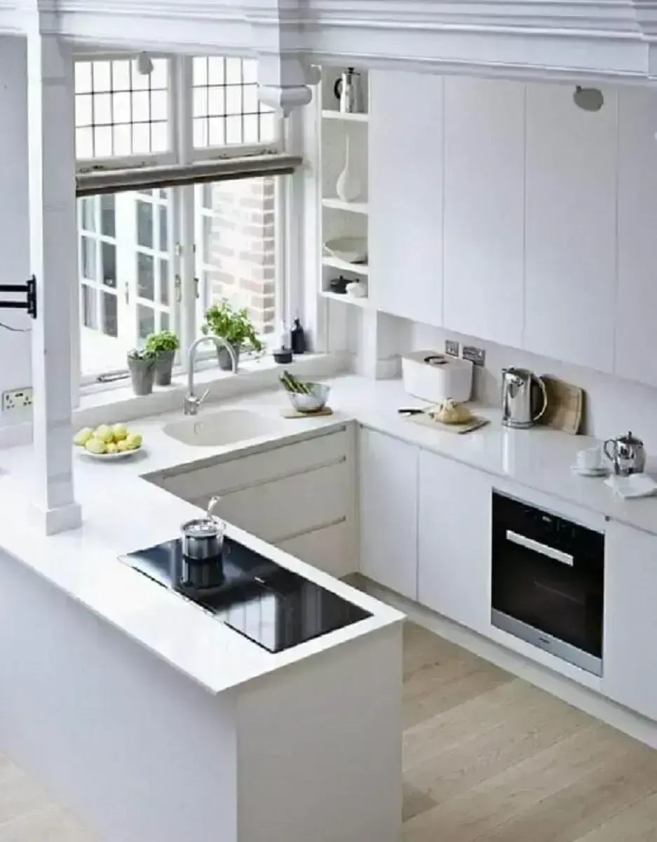 decoração clean com armário de cozinha planejado branco em U Foto Decoholic
