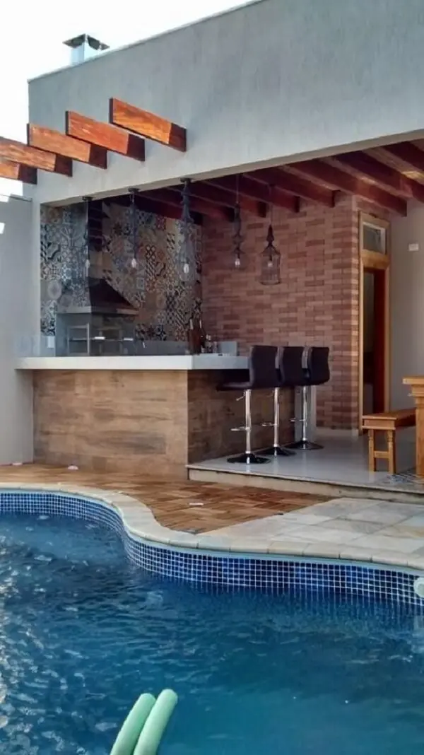 Projeto de área gourmet rústica com piscina