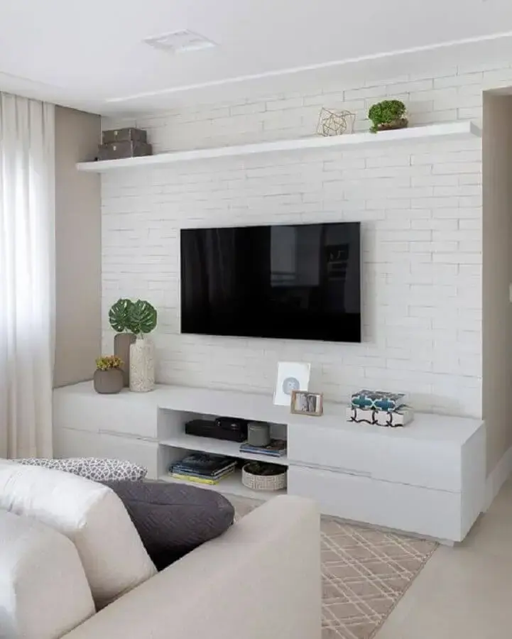 decoração de sala de TV com papel de parede tijolinho branco Foto Pinterest