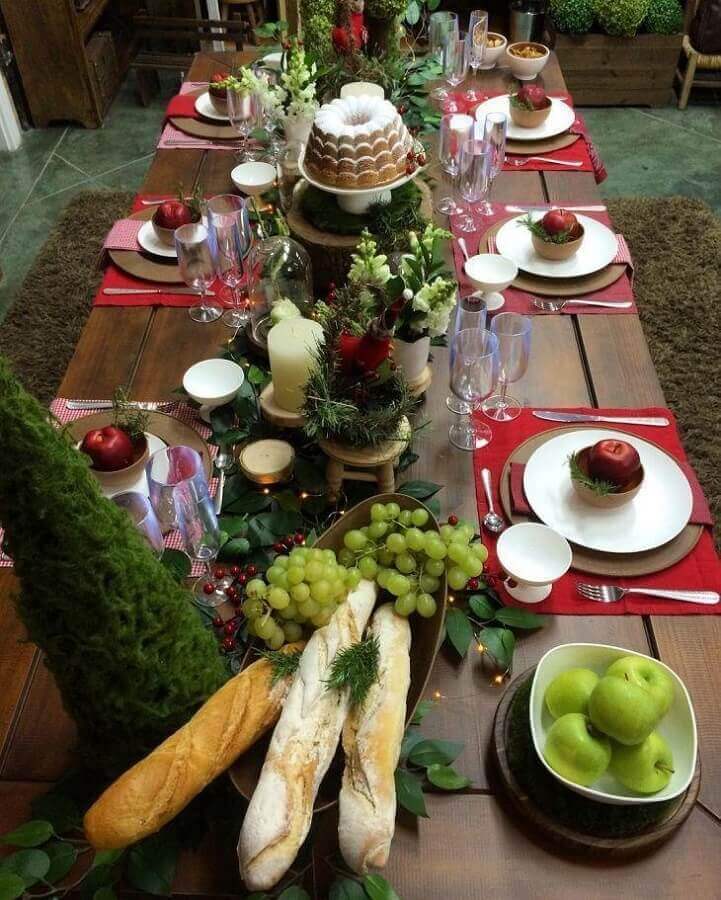 Ideia de enfeites de natal para mesa com frutas e comidas Foto Omelette Eventos