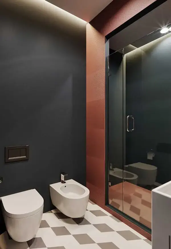 Vaso sanitário e bidê discreto e moderno complementam a decoração do banheiro