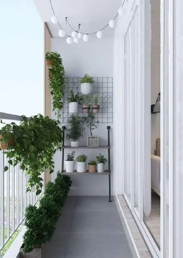 decoração minimalista e simples com plantas para varanda pequena Foto Iaza
