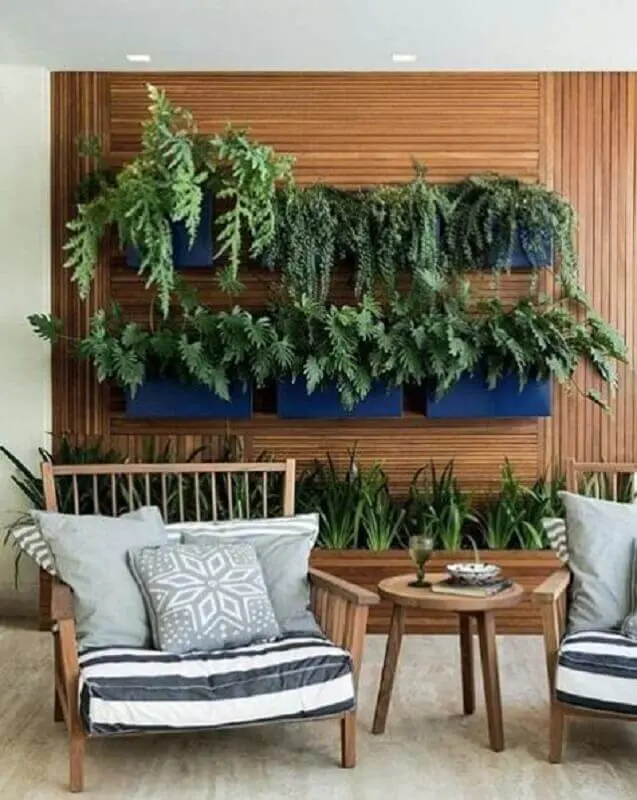 decoração moderna com plantas para varanda de apartamento com poltronas confortáveis Foto Pinterest