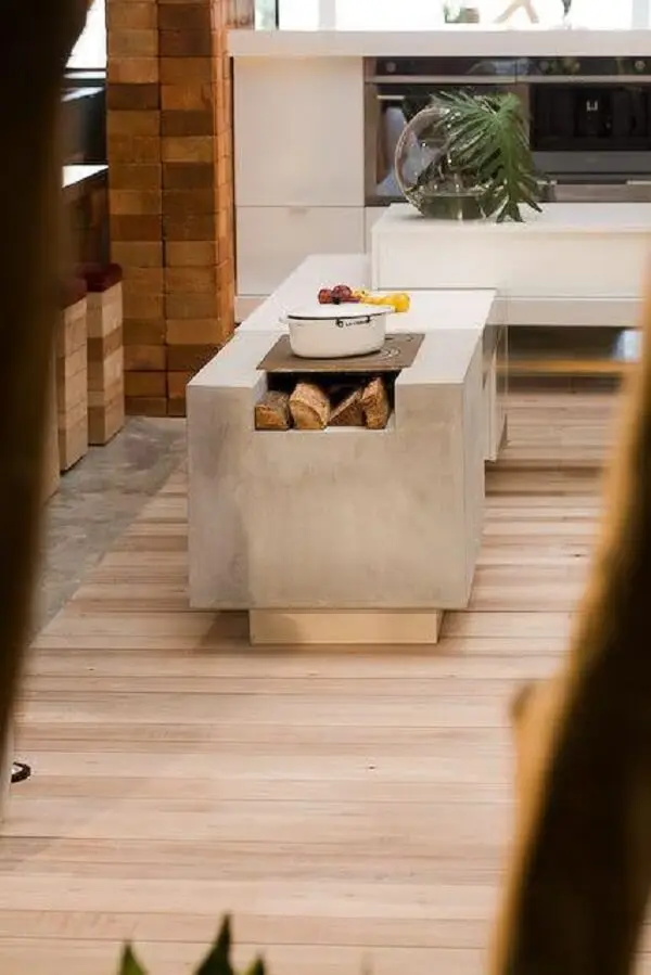 Projeto de cozinha moderna e sofisticada com fogão à lenha