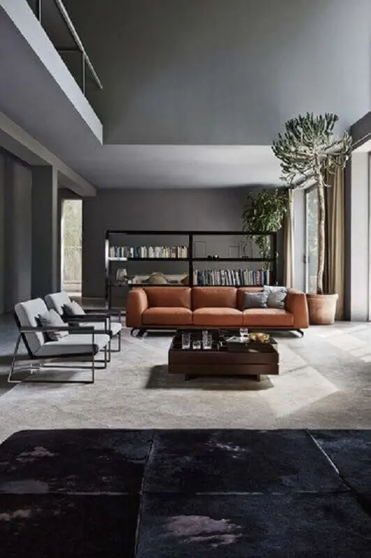 decoração moderna para sala cinza com sofá marrom Foto Architonic