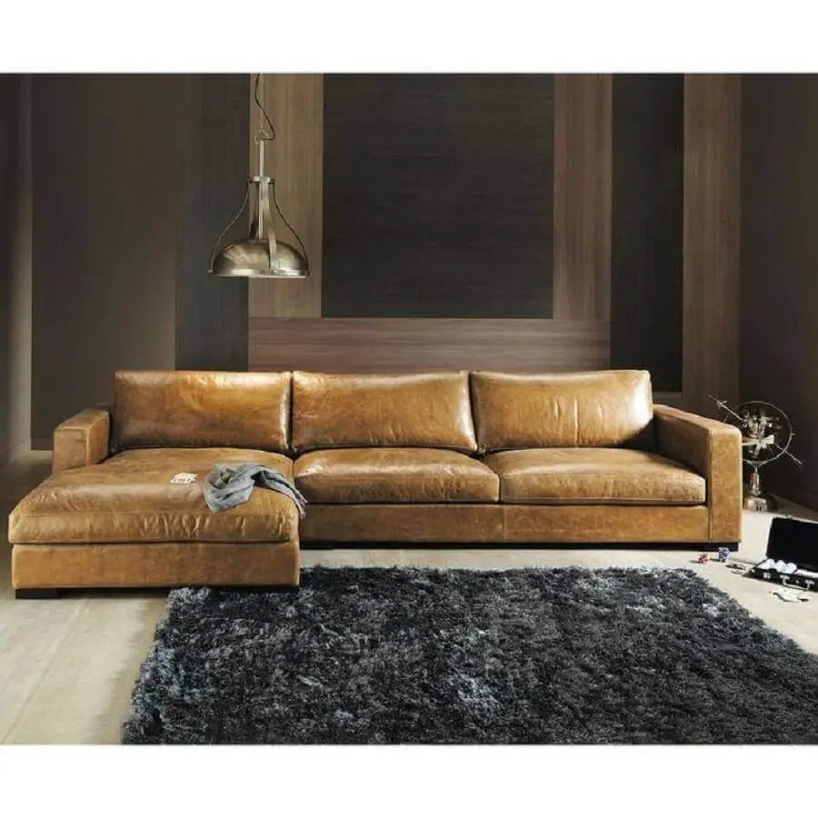 sala decorada com sofá grande com chaise e tapete cinza Foto Pinterest