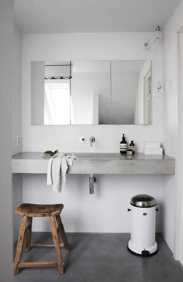 banqueta rústica e bancada de concreto para decoração banheiro minimalista Foto Planete-deco