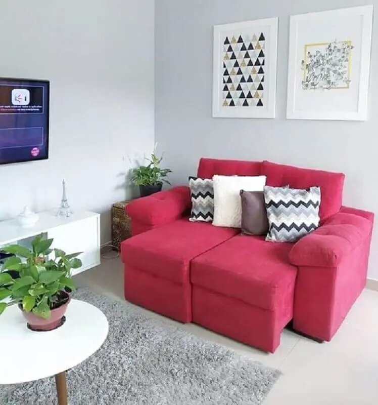 decoração de sala simples com sofá retrátil pequeno cor de rosa Foto Pinterest