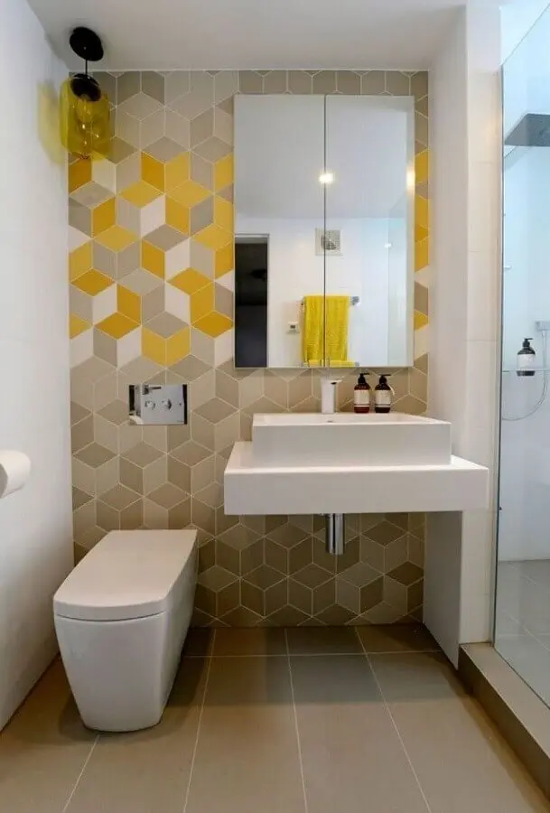 Decoração de banheiro simples com revestimento geométrico Foto GD-Home