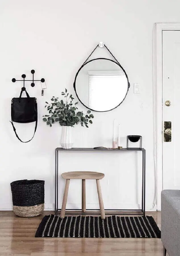 decoração minimalista com espelho redondo e aparador para hall de entrada Foto Futurist Architecture