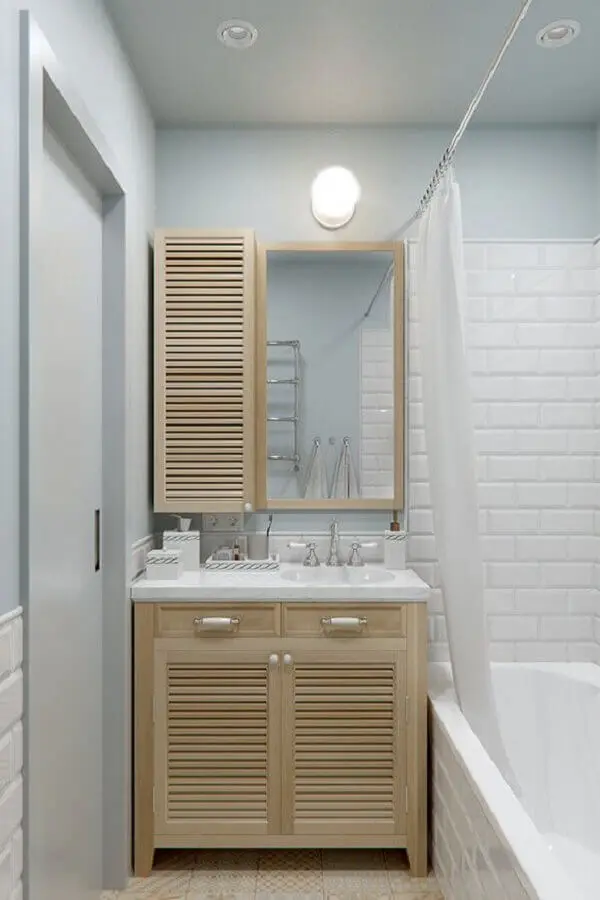 armário de banheiro pequeno simples em madeira clara